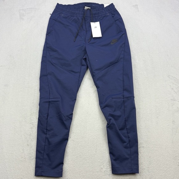Nike Pants Mens Small Navy Sportswear Tech Essentials Commuter Woven Tapered Zip